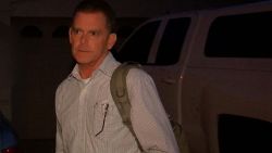 (CNN) -- In the early days of the investigation into the Las Vegas mass shooting, two people were named as persons of interest in the case, according to newly released police search warrants.        One was deceased shooter Stephen Paddock's girlfriend, Marilou Danley, who has since been publicly cleared in the case. The name of the other was redacted in hundreds of pages of documents released Tuesday to the media.        The Las Vegas Review-Journal has identified that individual as Douglas Haig. Haig did not respond to phone calls Tuesday evening.