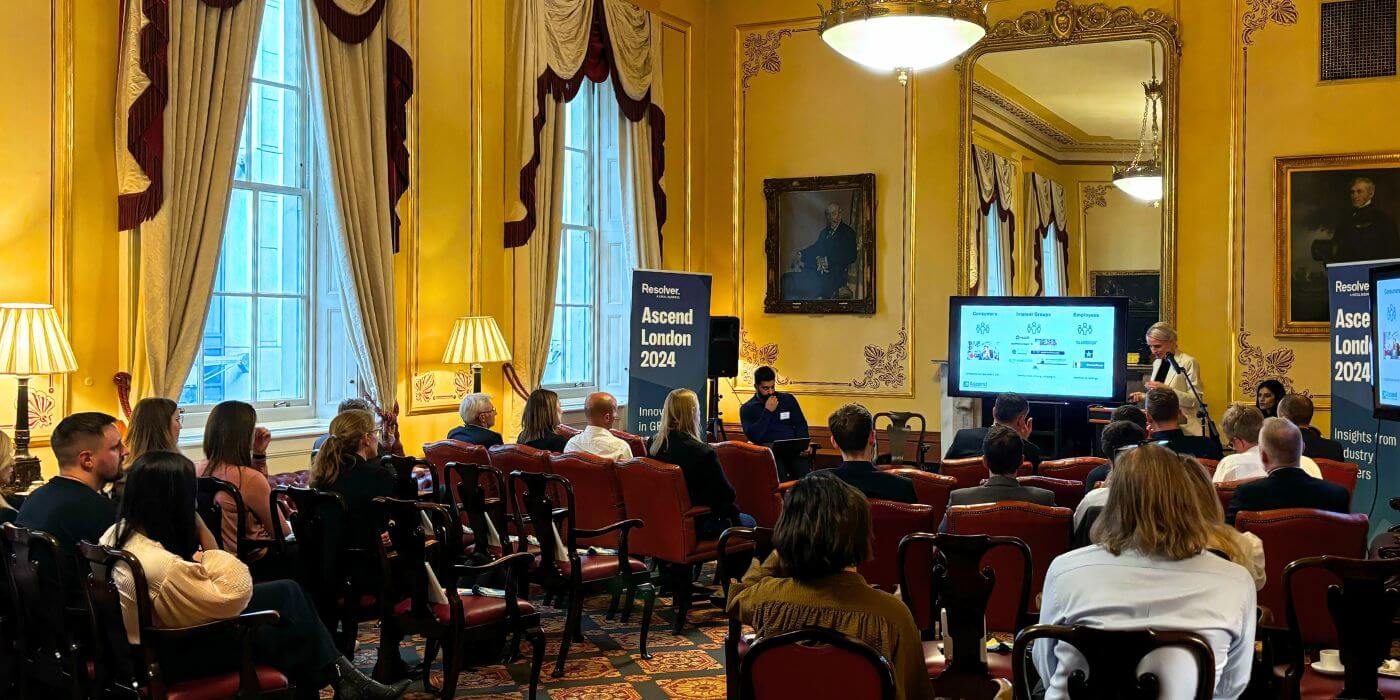 Audience attentively listening to a presentation on innovations shaping the future of grc at ascend london 2024.