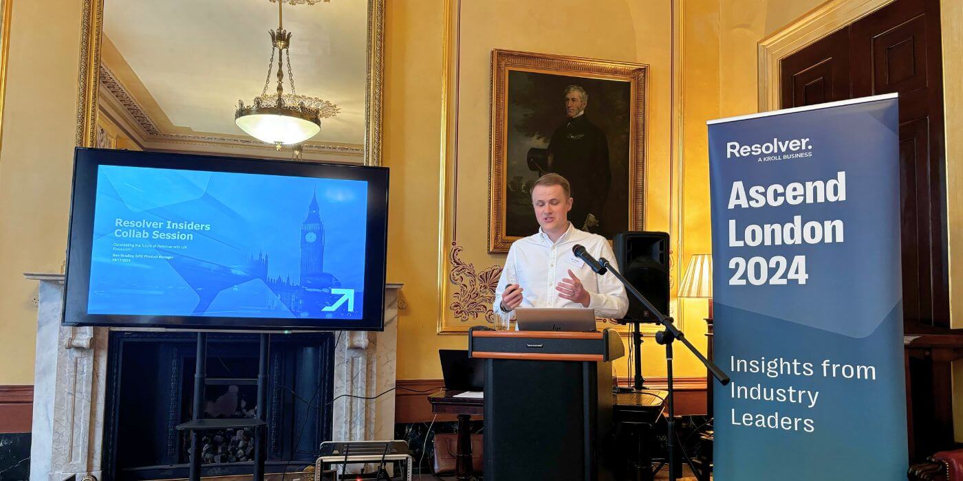 A speaker presents a presentation on shaping the future of grc during ascend london 2024.