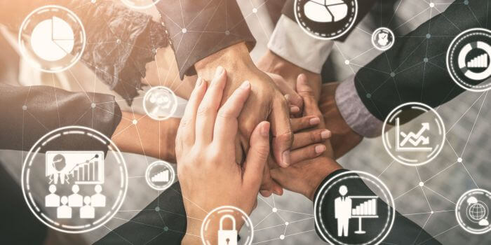 Five hands on top of each other with digital icons floating around the image representing the distinctions between a security incident, a complaint, and a risk event