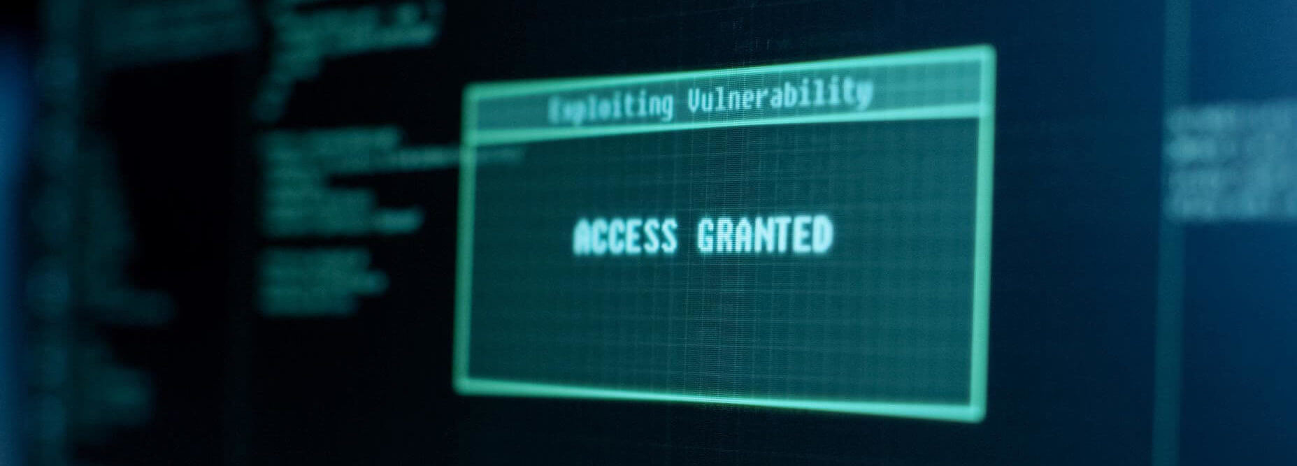 Display showing stages of hacking in progress: exploiting vulnerability, executing and granted access.