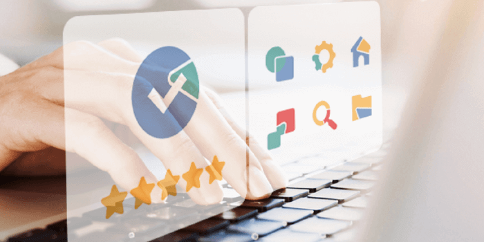 Male fingers tapping on laptop keyboard with digital icons overtop representing integrated grc software